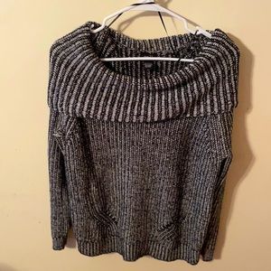 Black and white sweater, fashionable.